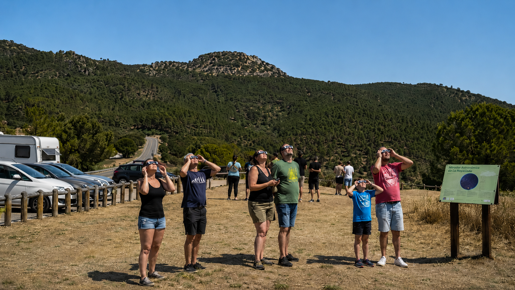 Personas con gafas protectoras mirando al cielo